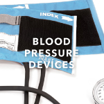 Image of blue blood pressure cuff on white background. White text overlay says 